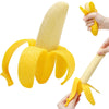A hand is holding a yellow stretchy banana fidget toy, demonstrating its flexible shape.