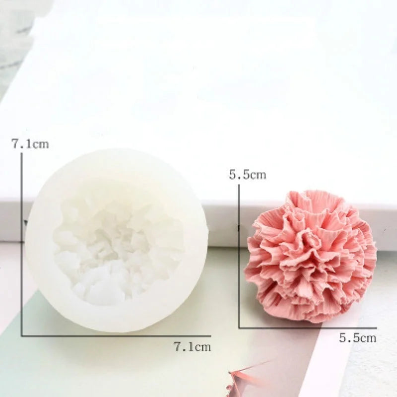 A pink ruffled flower silicone mold for soap, candle, or cake decorating shown next to its dimensions.
