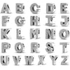 A collection of personalized sterling silver alphabet charm beads featuring cubic zirconia stones.
