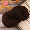 A ball of dark brown premium alpaca blend yarn used for knitting or crochet projects.