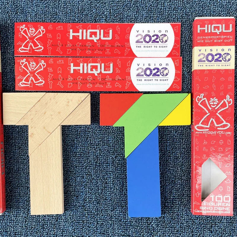 A wooden tangram puzzle featuring geometric shapes, including a large 'T' shape and various colored pieces.