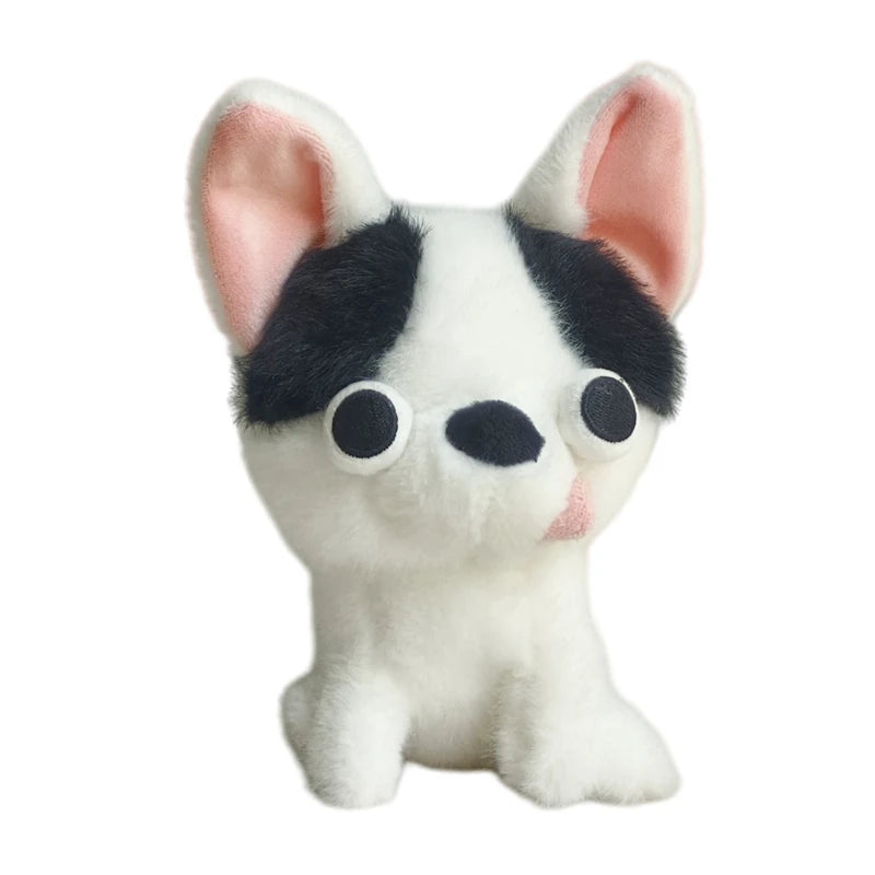 A white and black Chihuahua plush doll with its tongue sticking out.