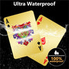 A set of gold playing cards with red aces and hearts, labeled as ultra waterproof.