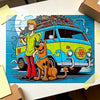 A 30-piece jigsaw puzzle featuring Scooby-Doo and Shaggy characters on a yellow van.