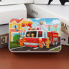 A jigsaw puzzle depicting a fire engine and firefighters in front of colorful buildings.