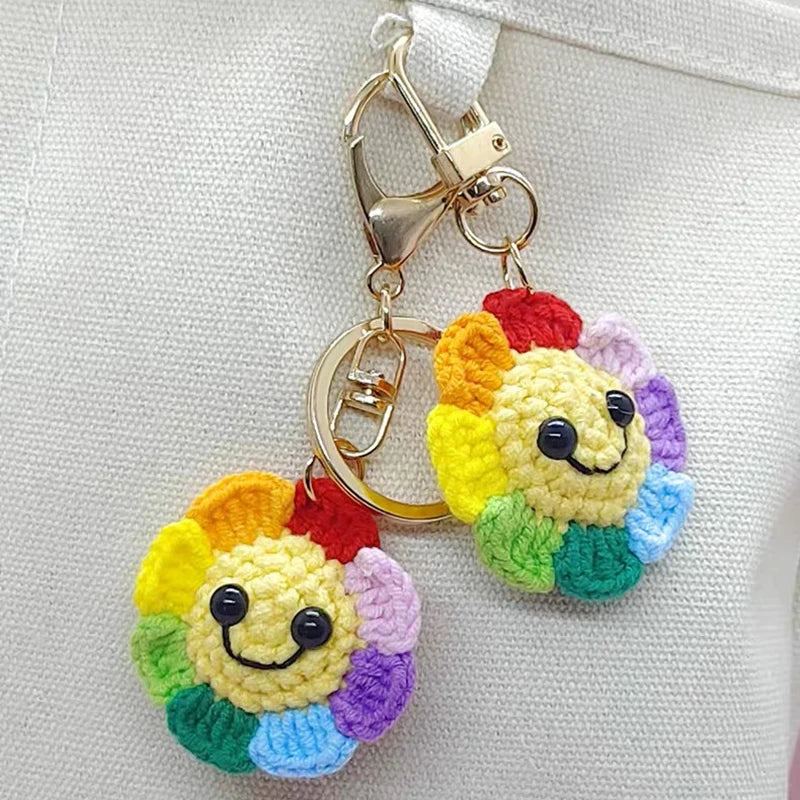 Handmade crochet sunflower decorative smile orb with gold-toned jewelry findings