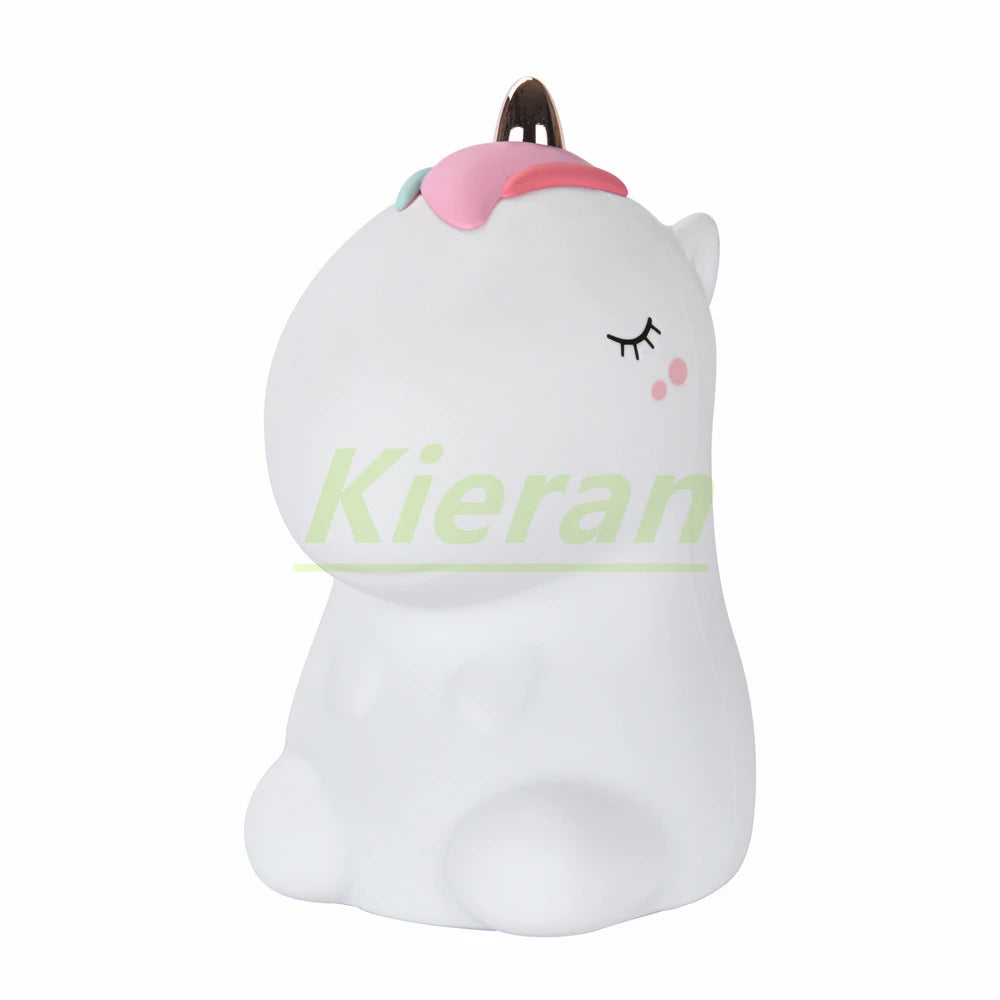 A white unicorn LED night light with a pink horn and touch control features.