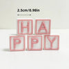 Pink acrylic letter blocks spelling HAPPY with a measurement guide.