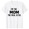 A white t-shirt with black text that reads I'm the mom the real boss