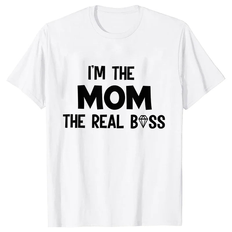 A white t-shirt with black text that reads I'm the mom the real boss
