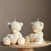 White silicone mold shaped like a teddy bear hugging a heart for candles and resin