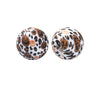 A pair of spherical silicone beads featuring a leopard print design with orange pumpkin patterns.