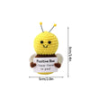 Handmade yellow crochet bee doll with black eyes and gold antennae, featuring the slogan I bee-leave in you!
