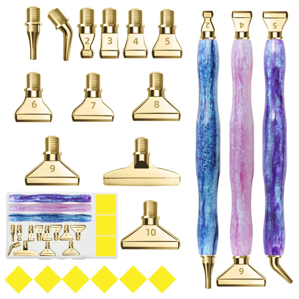 A set of ten resin diamond painting pens with interchangeable metal tips and multi-placers shown in various colors and gold a