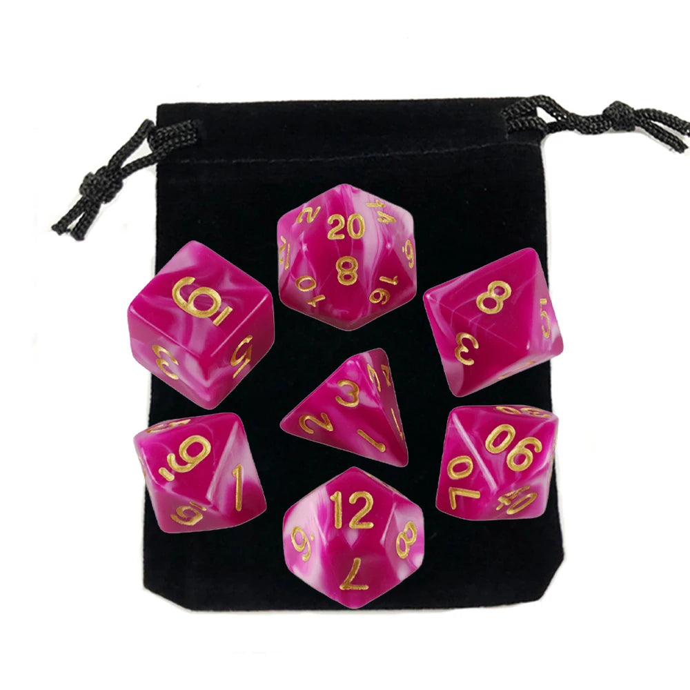 A set of pink and clear polyhedral dice stored in a black fabric bag.