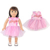A doll wearing a pink unicorn skirt outfit with a matching top and sheer overlay.
