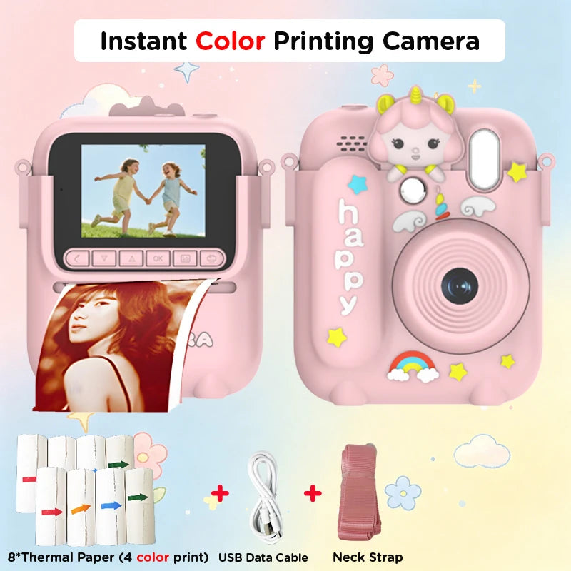 A pink instant color printing camera with a built-in camera and accessories like thermal paper and a neck strap.