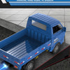 Blue 1:16 scale 4WD RC truck driving over a textured surface.