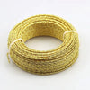 A coil of flexible gold-colored aluminum craft wire for jewelry making and DIY projects.