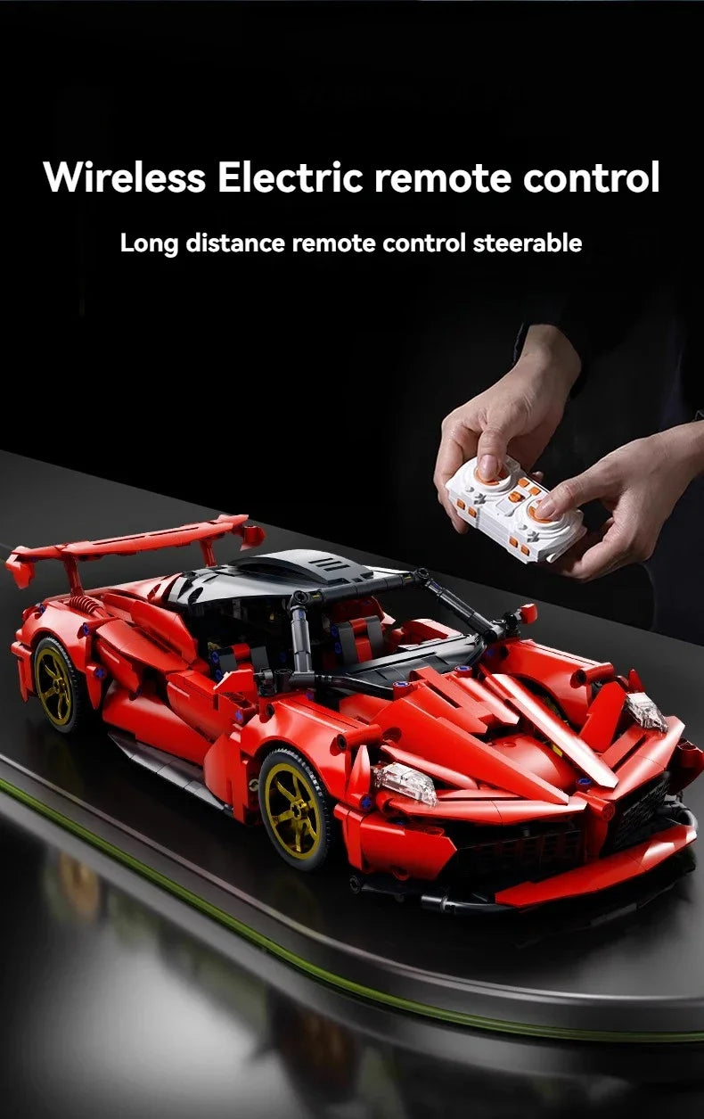 A red die-cast hypercar model is shown with a wireless remote control being held above it.