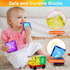 A baby is playing with colorful, durable magnetic building blocks made of non-toxic ABS plastic.