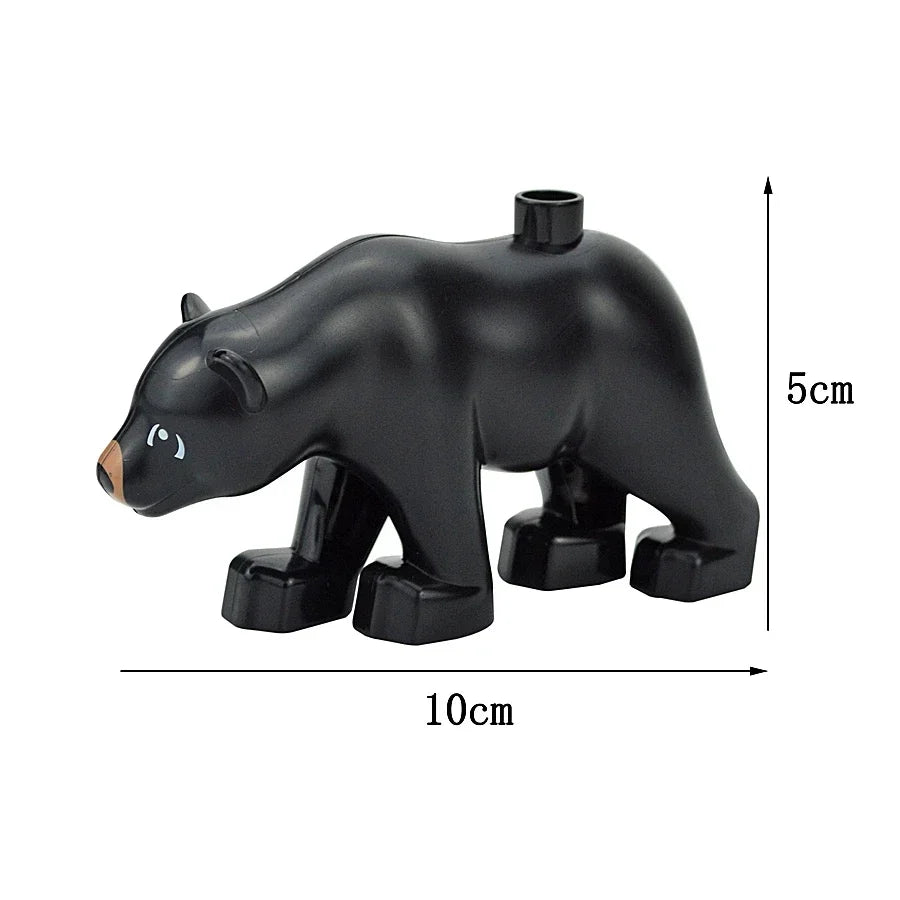 A black elephant shaped building block with a hole on top, shown from the side.