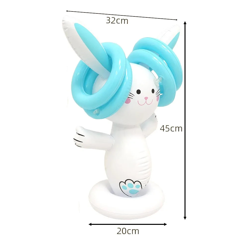 A white cat figurine with blue hair and a matching base, part of an Easter egg and spoon race game set.