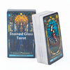 A box of the Stained Glass Tarot card deck featuring an illustration of a figure within an arched window.