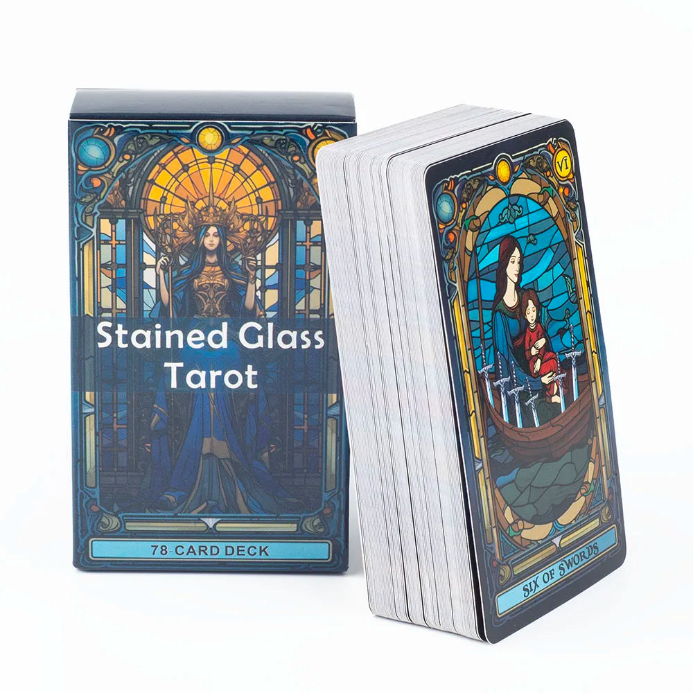 A box of the Stained Glass Tarot card deck featuring an illustration of a figure within an arched window.