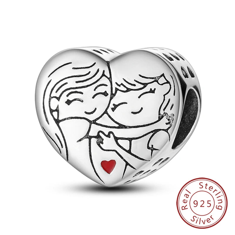 A sterling silver heart charm depicting two smiling figures embracing, with a small red heart detail.