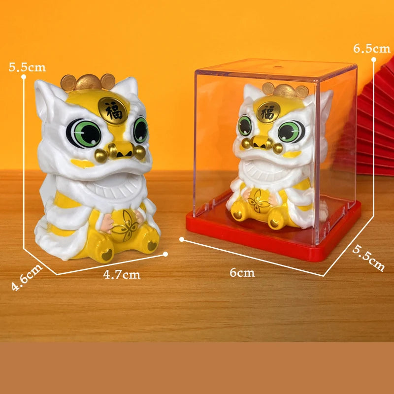 A white and yellow solar-powered shaking head lion figurine displayed on a wooden surface.
