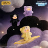 A purple and yellow plush toy is featured against a dark, starry background with fluffy clouds.