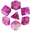 A set of purple and pink galaxy polyhedral dice showing various numbers and cosmic effects.