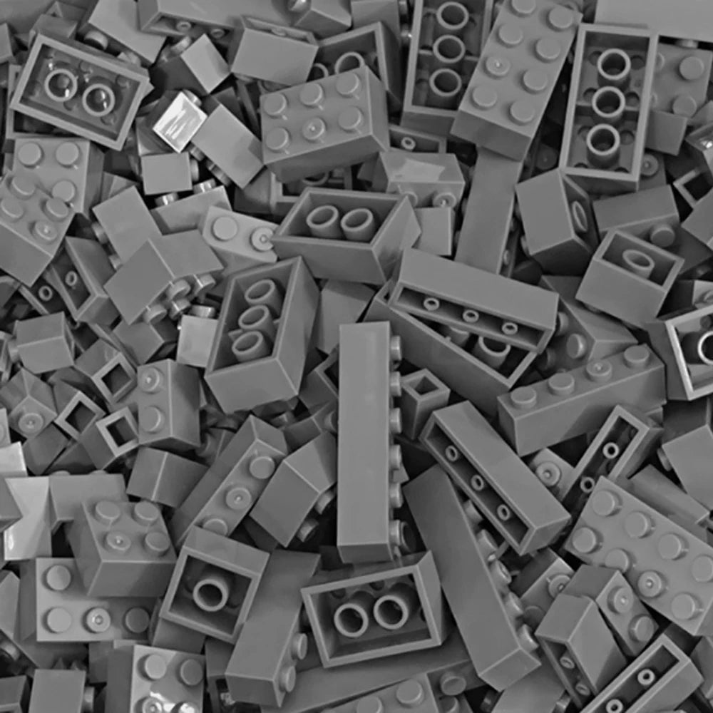 A pile of gray building blocks used for creative DIY projects.