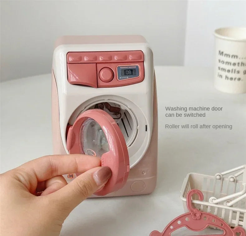 A hand is opening a pink kids pretend play kitchen appliance with a door to access the roller.