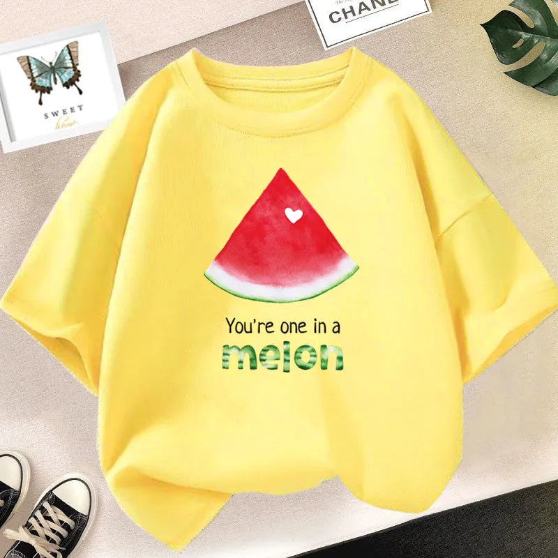 Yellow long-sleeve shirt featuring a red watermelon slice graphic and the text You're one in a melon.