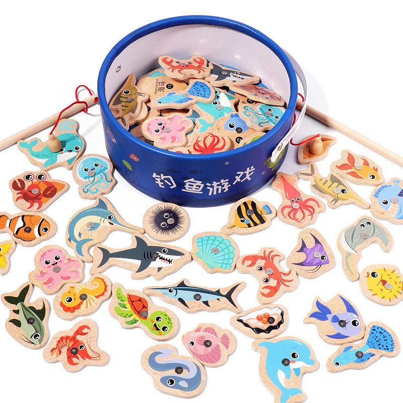 A collection of wooden magnetic fishing game pieces in various shapes and colors inside a blue bowl.