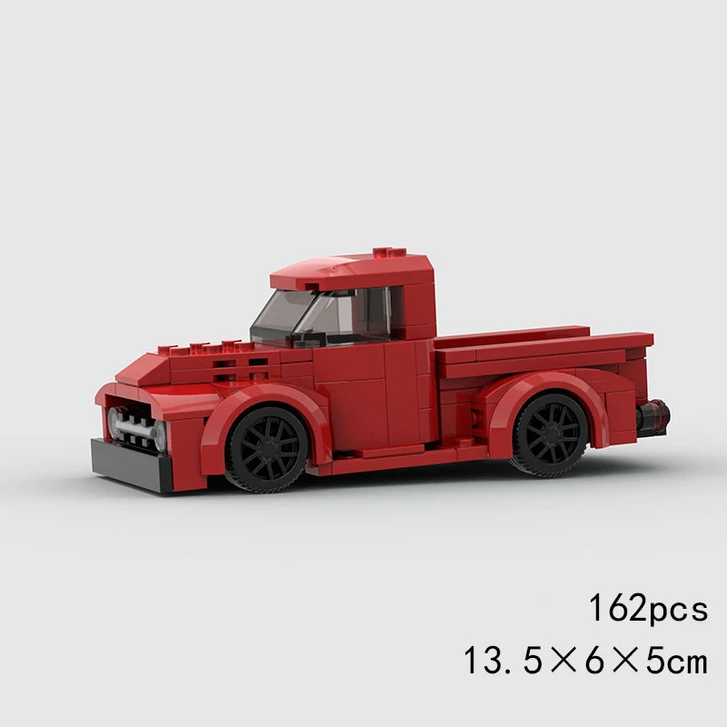 A red classic rally car building block model kit with a cab and open body.