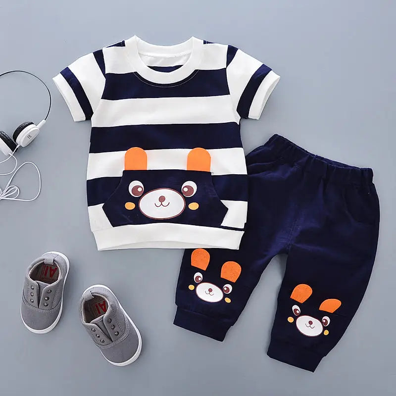 A navy and white striped boys' cotton summer short sleeve t-shirt and shorts set.