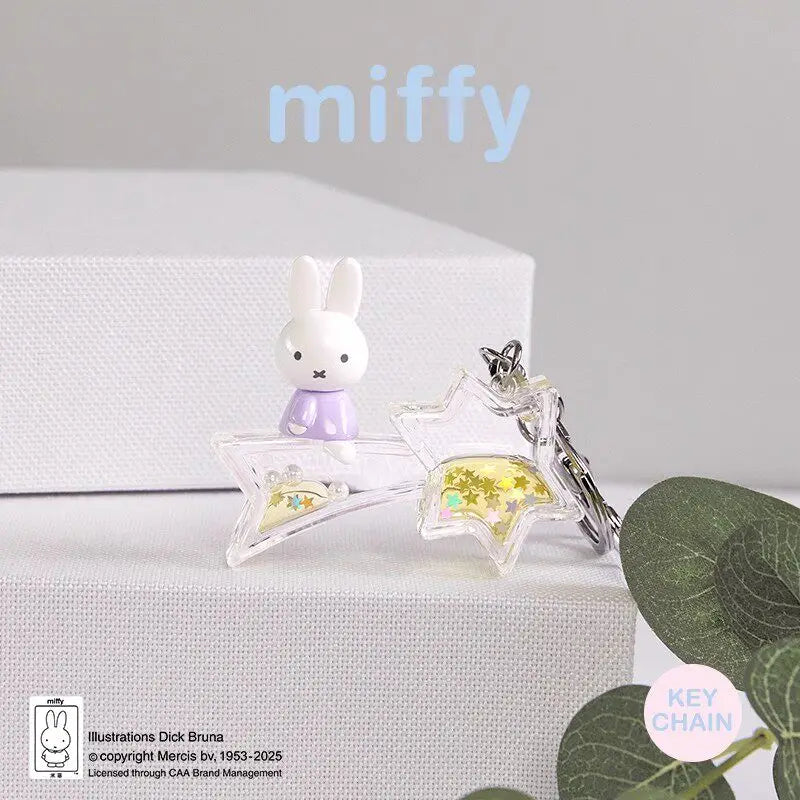 A Miffy Dream keychain featuring a small white rabbit charm and a star-shaped clear charm.