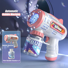 A pink and white automatic bubble machine gun is shown spraying bubbles against a dark background.