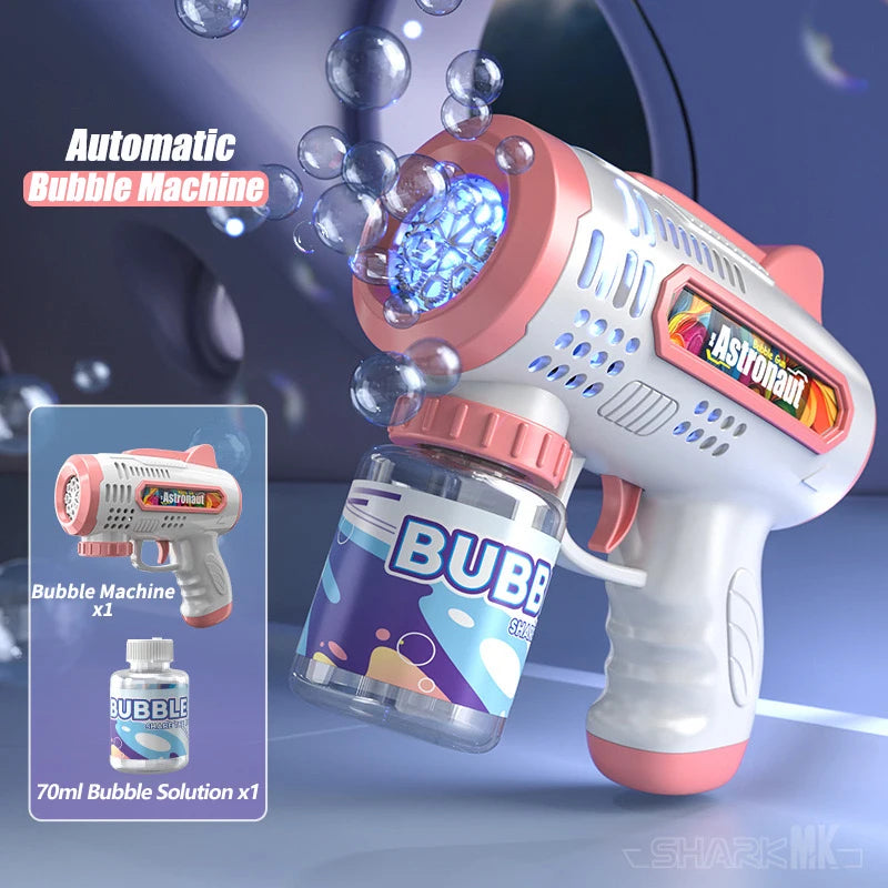 A pink and white automatic bubble machine gun is shown spraying bubbles against a dark background.