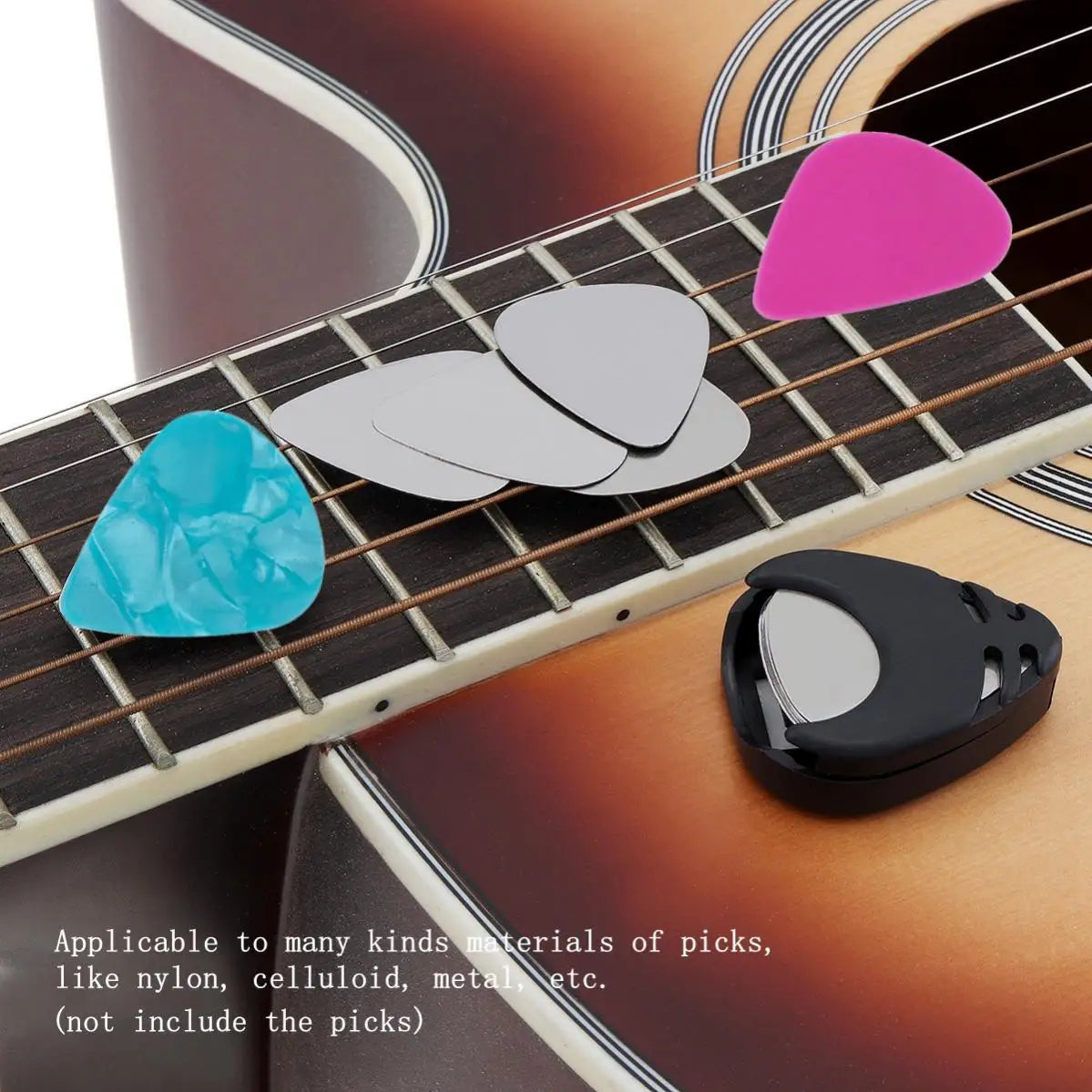 A black guitar pick holder with six colored picks resting on a wooden guitar fretboard.