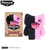 A pair of black and pink Fuggler tooth monster plush toys, featuring exaggerated teeth and soft textures.