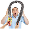A man is holding a spring snake prank can with a realistic chip design in front of his face.