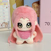 A pink plush keychain featuring an anime-style character with large eyes and a pink checkered neck covering.