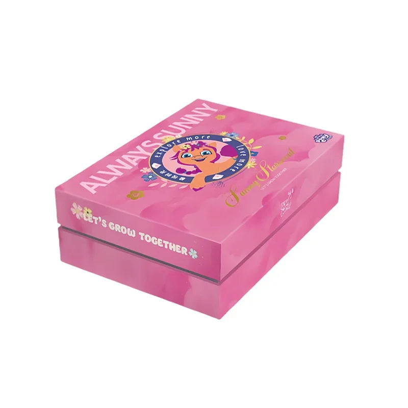 Pink box of My Little Pony Friendship Is Forever Shining Moon collectible cards with gold lettering.