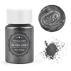 A dark glass jar of silver grey pearl powder next to a swirling texture and a pile of the powder.