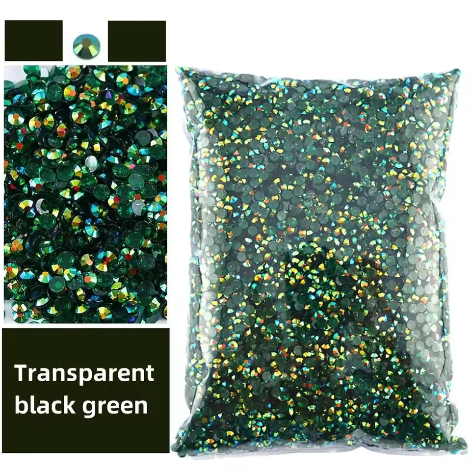 Bag of transparent black green resin rhinestones for crafts and DIY projects