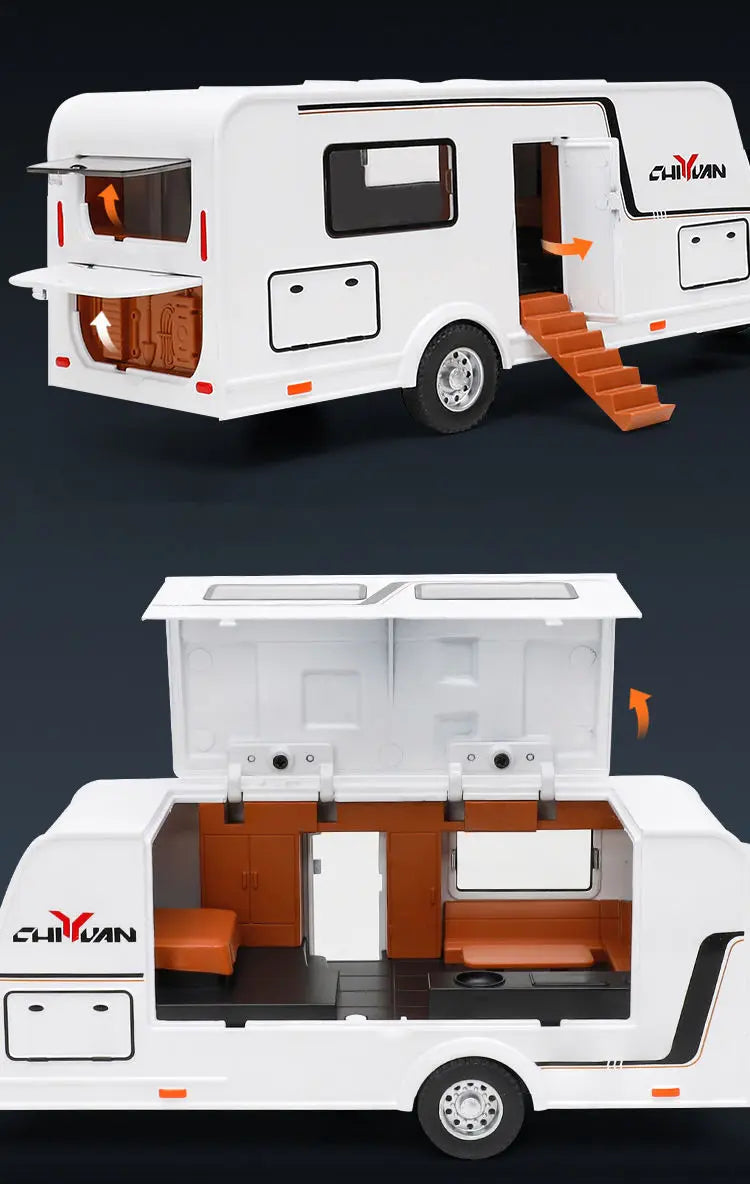 A white diecast metal RV camper truck model with an open storage compartment and exterior features.